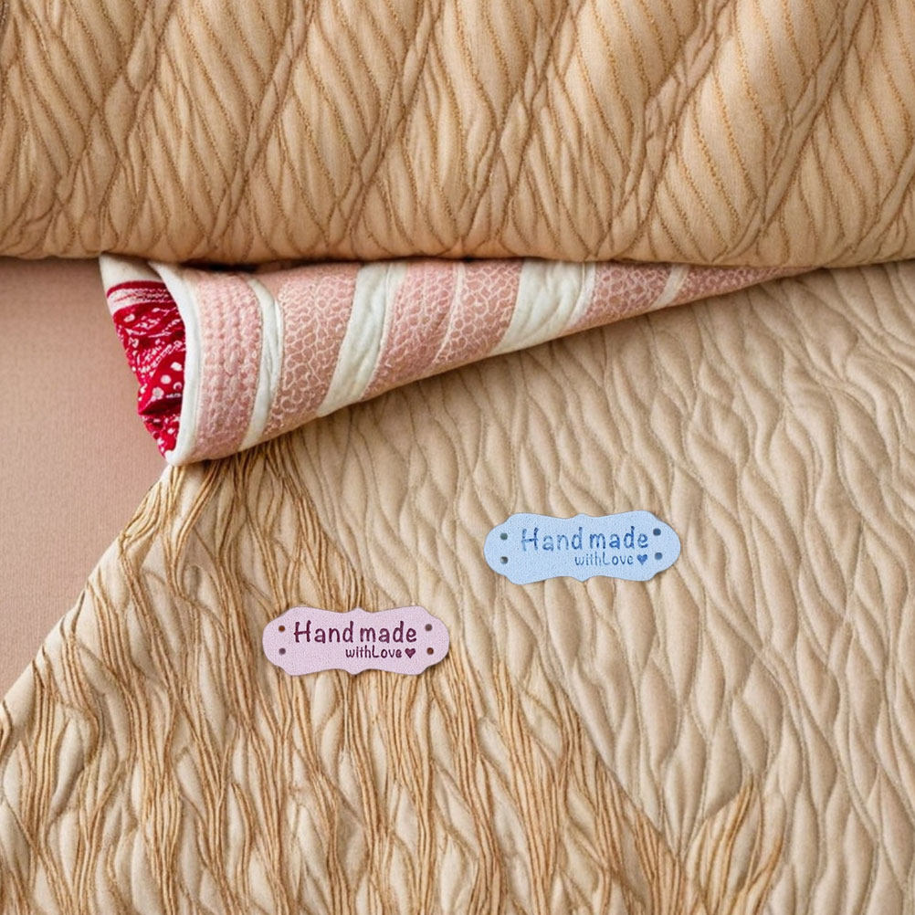 Sewing Label - 100Pcs Handmade Embossed Suede Labels Two